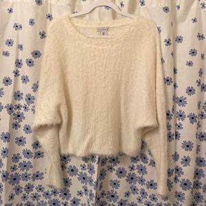 Size Medium slightly off white sweater